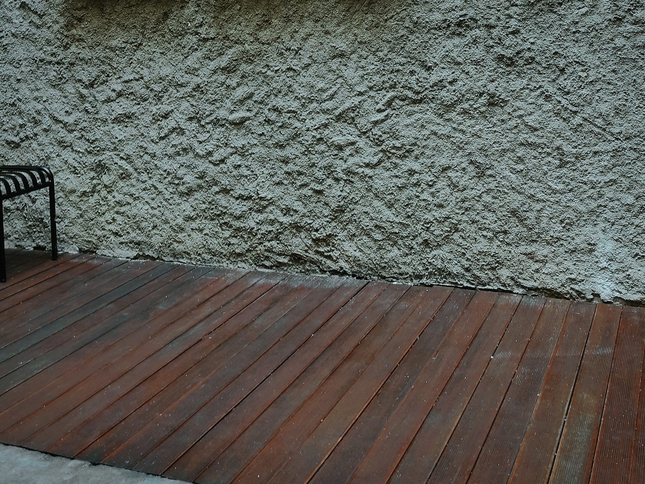 Can Wood Decking Be Installed Against Stucco